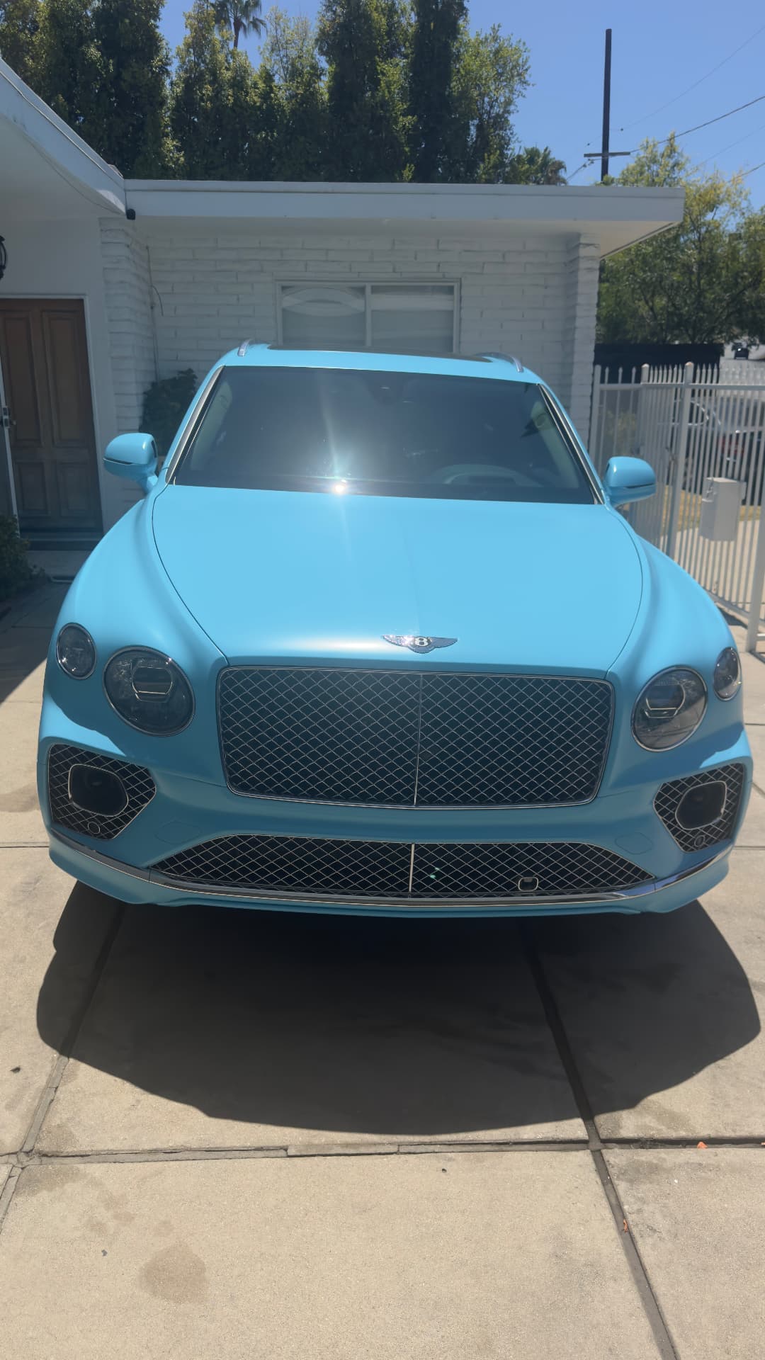 Light blue Bentley Bentayga after a full detail