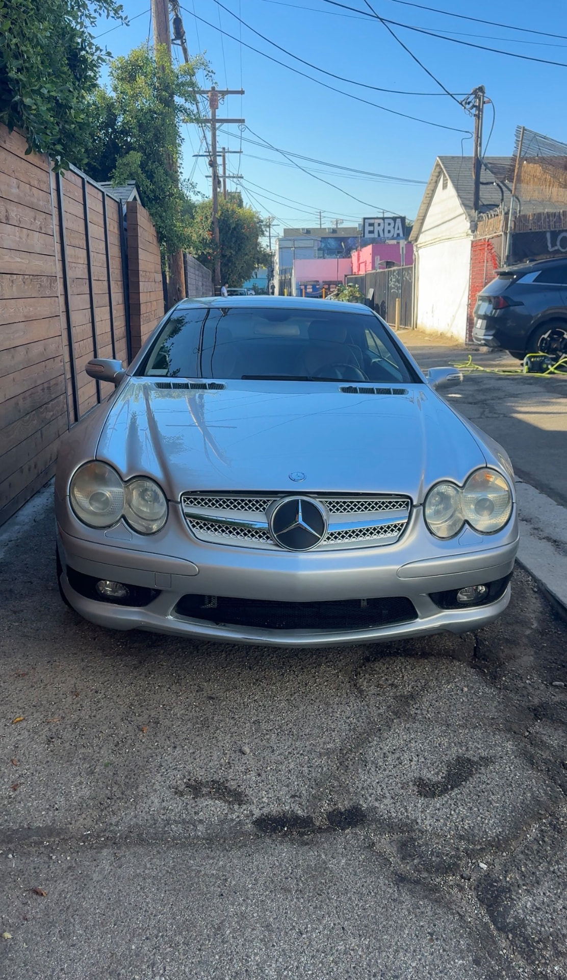 Silver Mercedes-Benz SL roadster after polishing